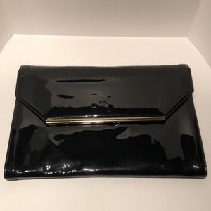 Black faux patent leather clutch with strap